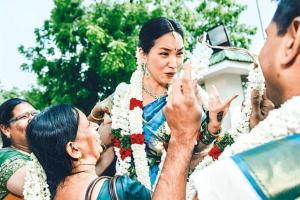 Jasmine flowers were the cultural giveaway at the wedding of a Korean girl to a Tamilian man, documented by photographer Mahesh Shantaram.